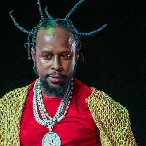 Popcaan performing on stage