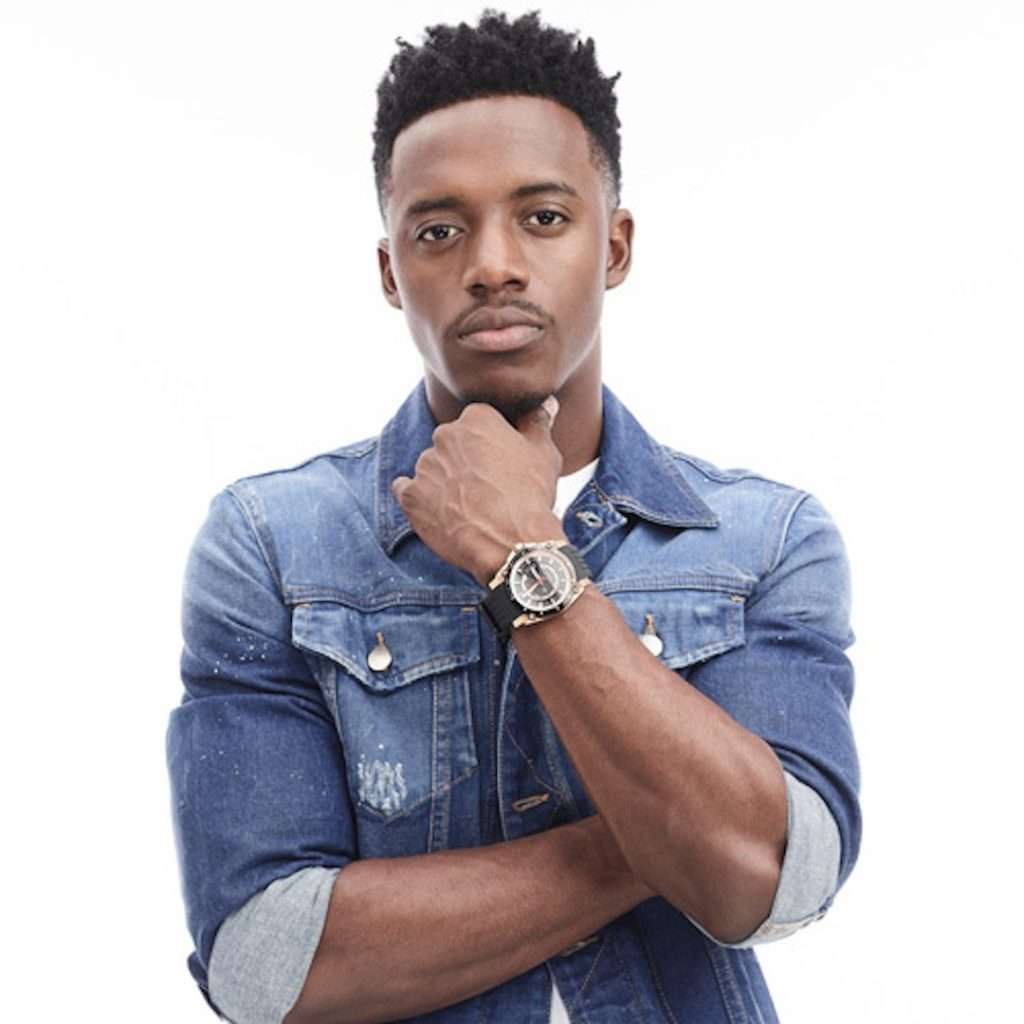 Romain Virgo performing on stage